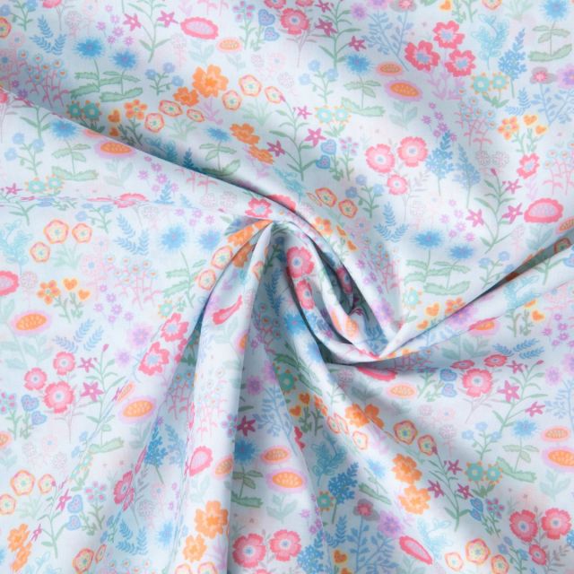 Tissu Popeline de Coton légère Petites fleurs et feuilles aquarelle pastel sur fond Bleu clair