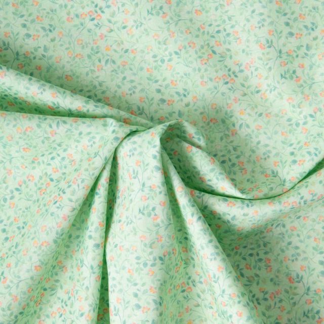 Tissu Popeline de Coton légère Fleur vert moyen et rose pêche sur fond Vert menthe clair