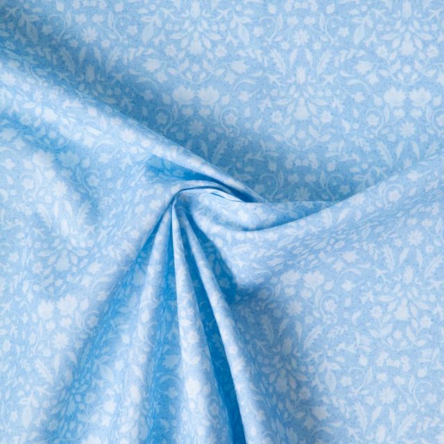 Tissu Popeline de Coton légère Floral romantique blanc sur fond Bleu clair