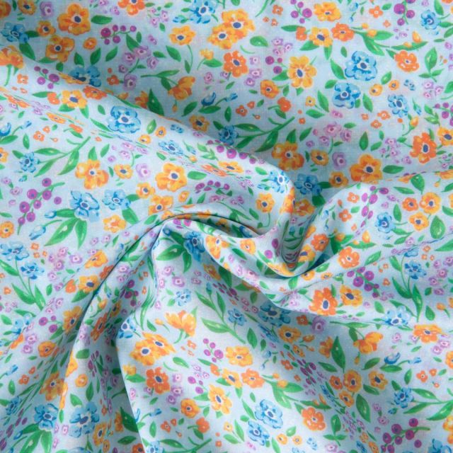 Tissu Voile de Coton digital imprimé Jardin d'été sur fond Bleu ciel