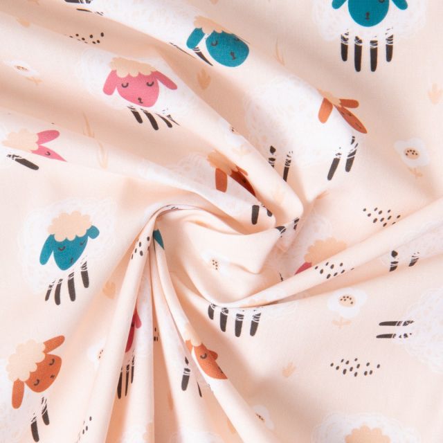 Tissu Coton imprimé Saute moutons sur fond Ecru