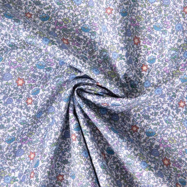 Tissu Batiste de Coton Charlie tapis fleuri sur fond Bleu lilas