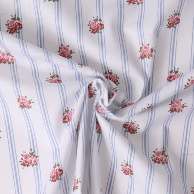 Tissu Popeline de Coton Eglantine rayures Bleues et fleurs Roses sur fond Blanc