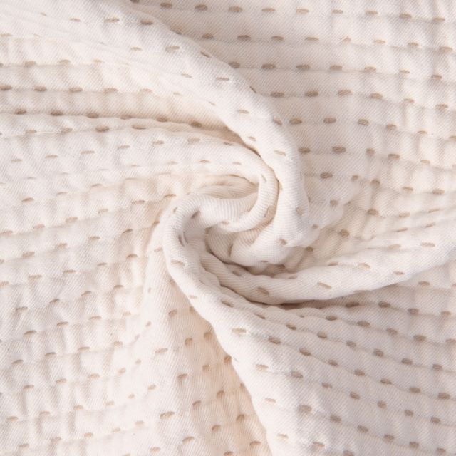 Tissu Coton Jacquard piqué pointillés relief sur fond Naturel