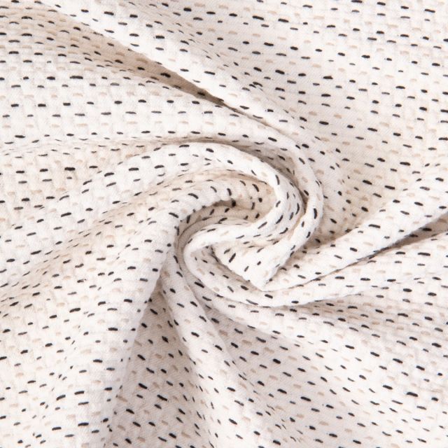 Tissu Jacquard Coton piqué pointillés Noir et Beige sur fond Ecru