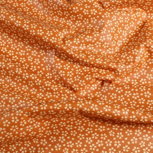 Tissu Coton enduit Myosotis sur fond Orange - Par 10 cm