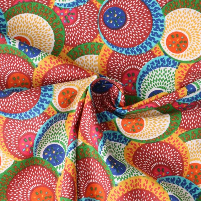 Tissu Popeline de Coton  Sahel rosaces stylisées sur fond Rouge