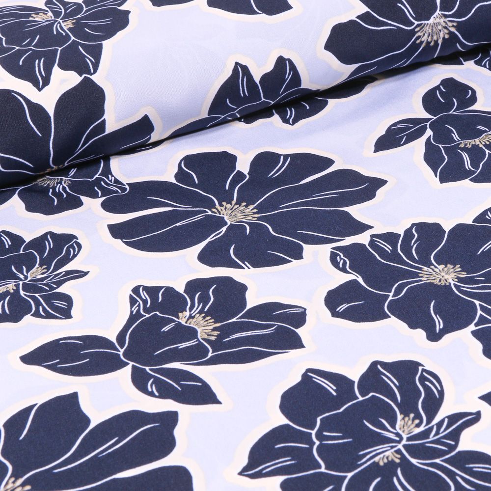 Tissu Imperméable Fleurs bleues sur fond Transparent - Par 10 cm