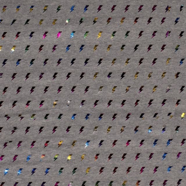 Tissu Jersey Coton Petit éclairs métallisés multicolores sur fond Gris chiné - Par 10 cm