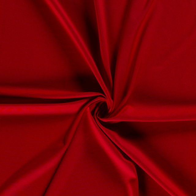 Tissu Jersey Viscose Nylon unicolour sur fond Rouge - Par 10 cm