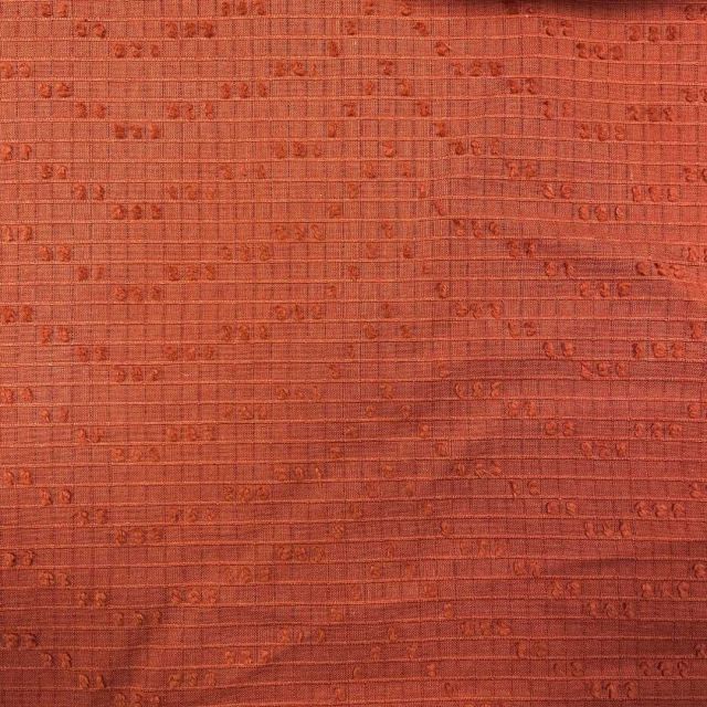 Tissu Voile de Coton Plumetis Dobby sur fond Paprika