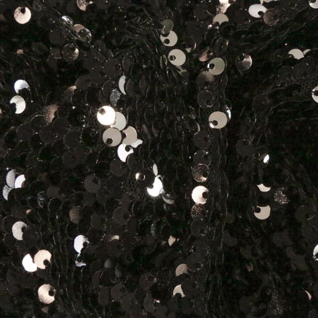 Tissu Sequins réversible argent sur fond Noir - Par 10 cm