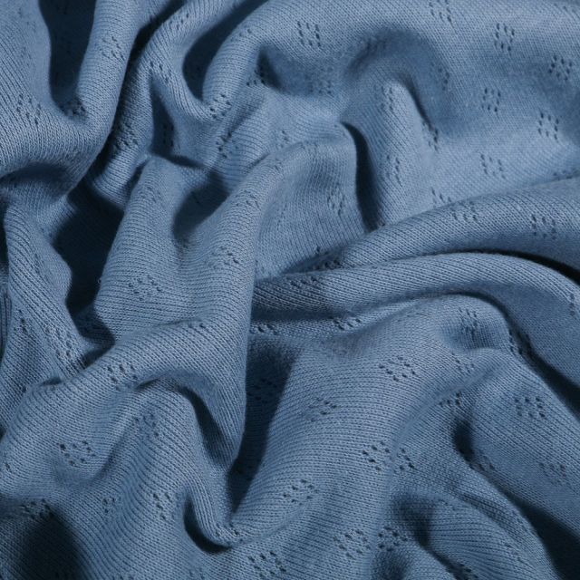 Tissu Jersey Coton ajouré uni Bleu denim - Par 10 cm