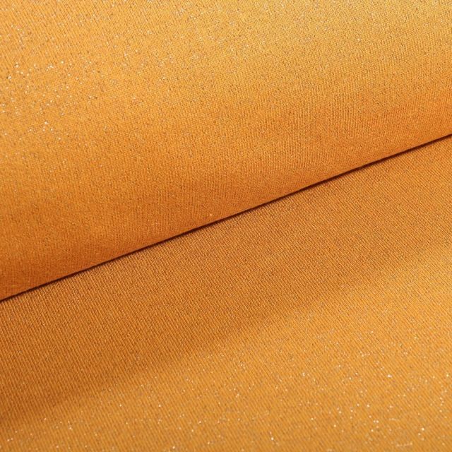 Tissu Sweat Paillettes argentées sur fond Moutarde - Par 10 cm
