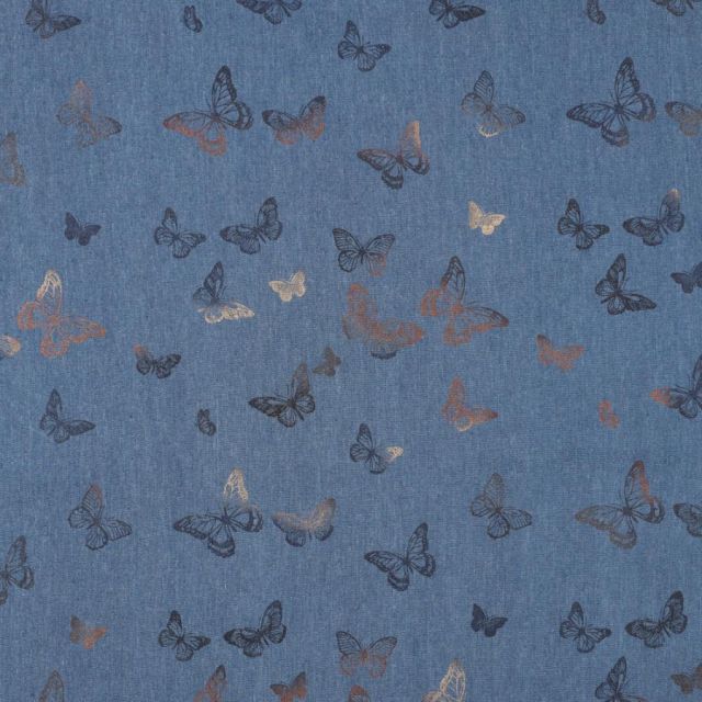 Tissu Chambray Coton imprimé Papillon argentés sur fond Bleu denim