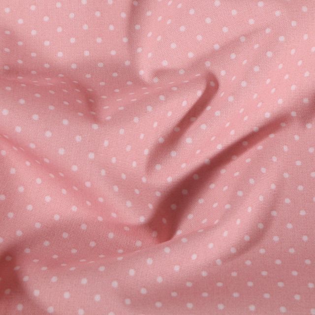 Tissu Coton enduit Petits pois blancs sur fond Rose bébé - Par 10 cm