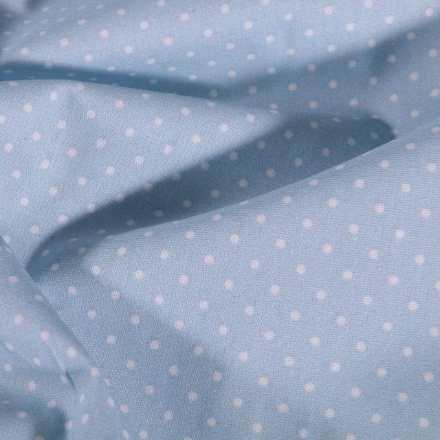 Tissu Coton enduit Petits pois blancs sur fond Bleu ciel - Par 10 cm