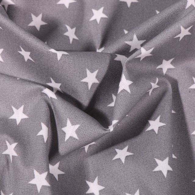 Tissu Coton enduit Etoiles blanches sur fond Gris clair - Par 10 cm