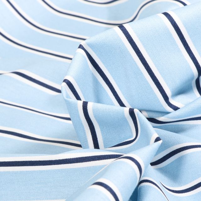 Tissu Coton imprimé rayures marine et blanches sur fond Bleu ciel