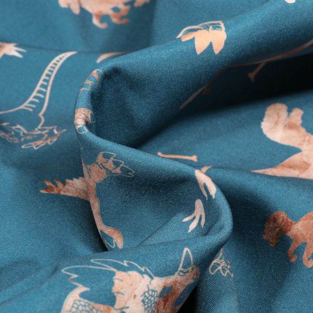 Tissu Softshell Dinosaures sur fond Bleu paon