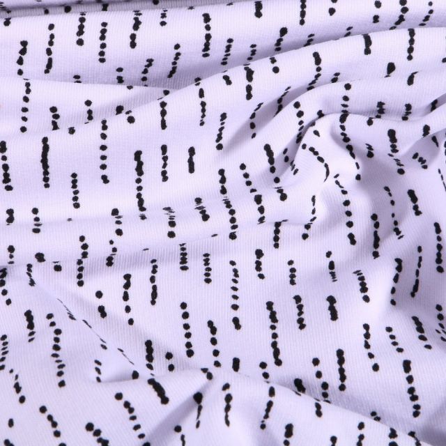 Tissu Jersey coton envers gratté Pointillés noir sur fond Blanc - Par 10 cm