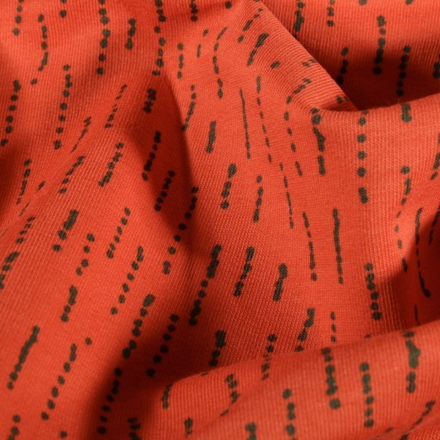 Tissu Jersey coton envers gratté Pointillés sur fond Orange - Par 10 cm