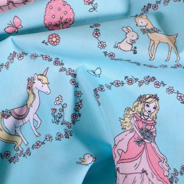 Tissu Coton imprimé Couronnes de fleurs princesses et licornes sur fond Bleu - Par 10 cm
