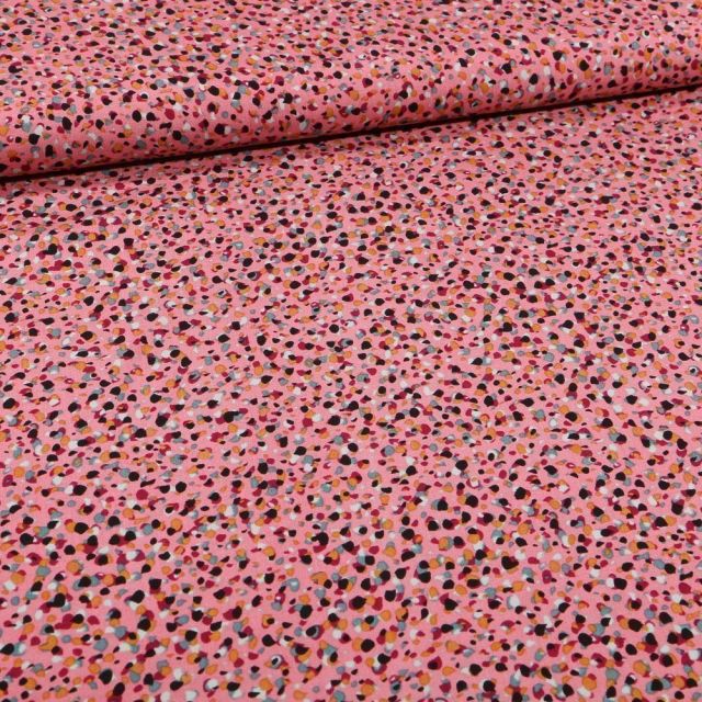 Tissu Viscose Confettis multicolores sur fond Rose - Par 10 cm