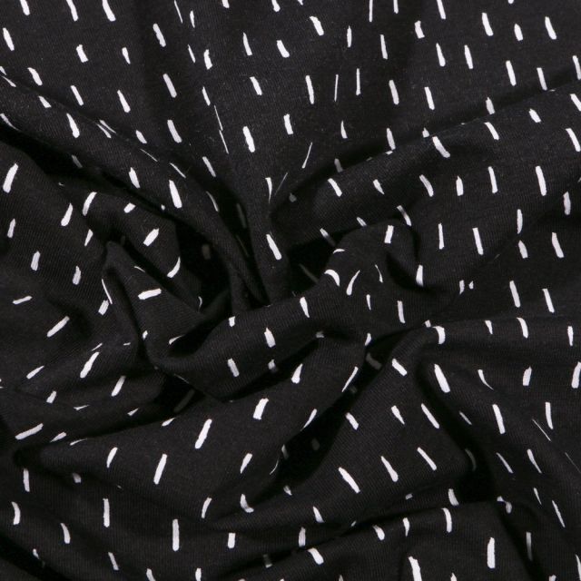Tissu Jersey Coton Bio Pointillés blancs sur fond Noir - Par 10 cm