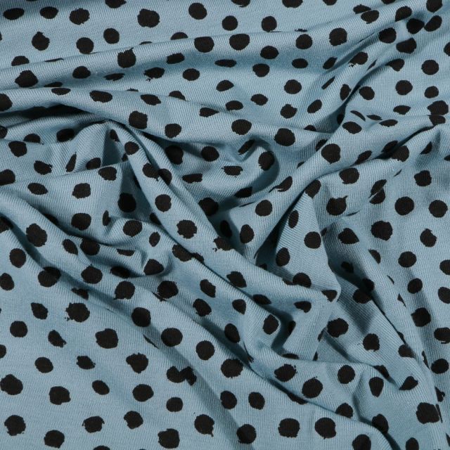 Tissu Jersey Coton Bio Pois déstructurés noirs sur fond Bleu ciel - Par 10 cm