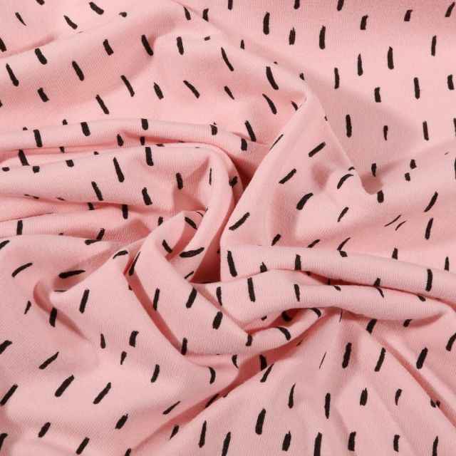 Tissu Jersey Coton Bio Pointillés noirs sur fond Rose pastel - Par 10 cm