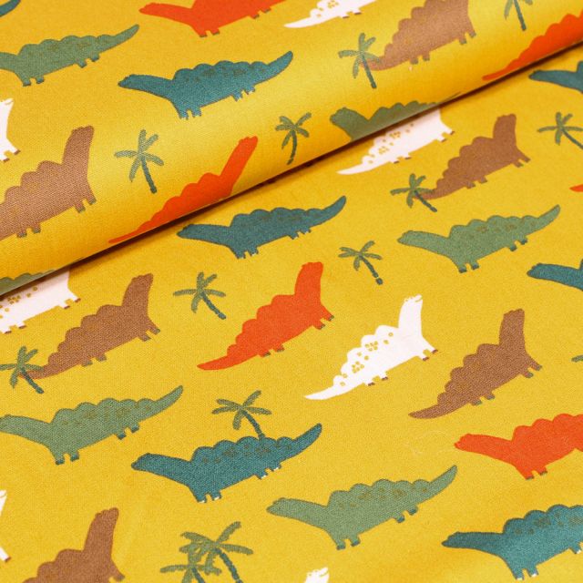 Tissu Coton imprimé LittleBird Dinosaures colorés sur fond Jaune