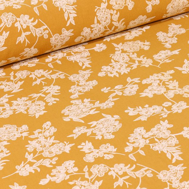 Tissu Coton imprimé Branches fleuries sur fond Jaune moutarde