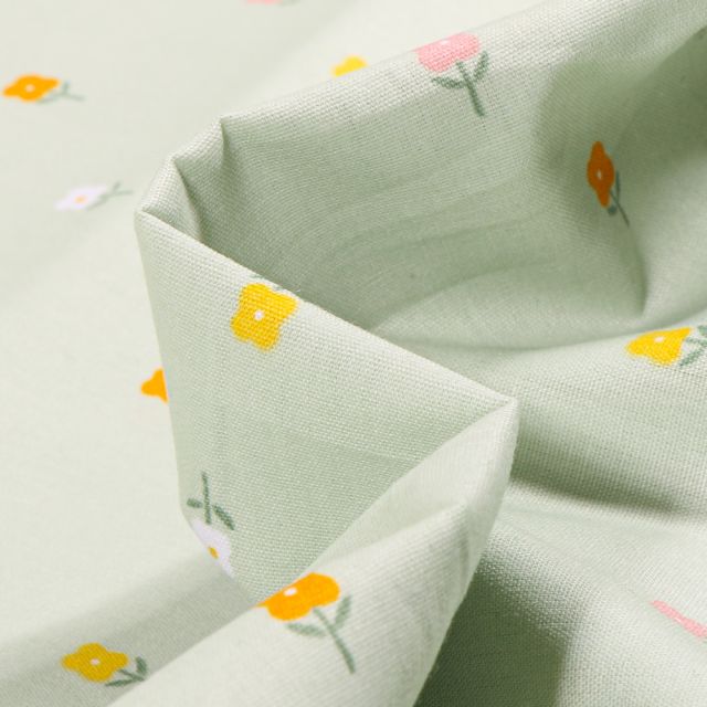 Tissu Coton imprimé LittleBird Mini fleurs sur fond Vert menthe