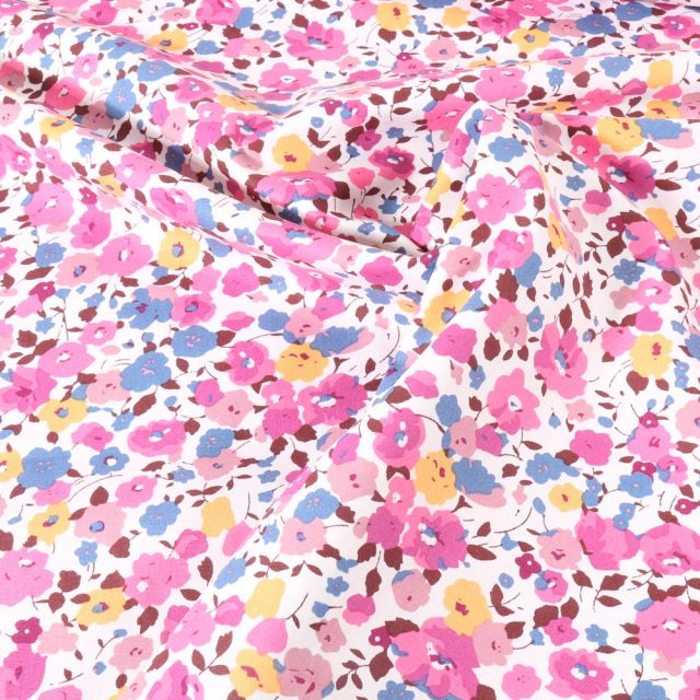 Tissu Voile de Coton imprimé Fleuris rose et bleu sur fond Blanc