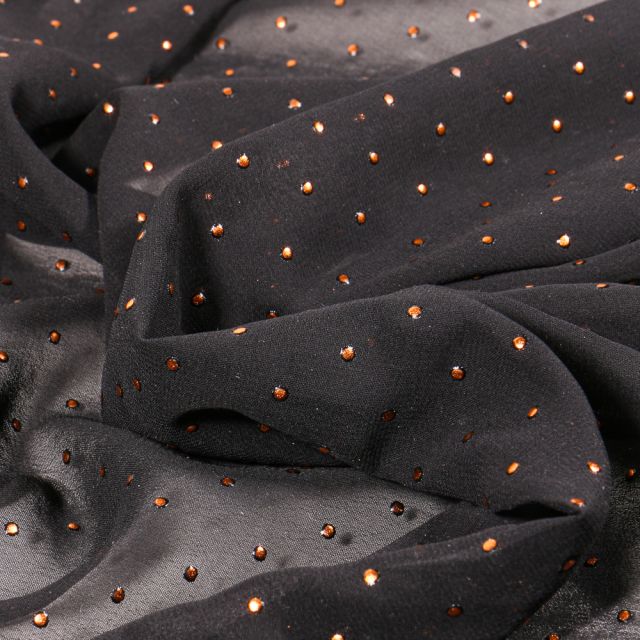 Tissu Mousseline Pois métallisé cuivre sur fond Noir