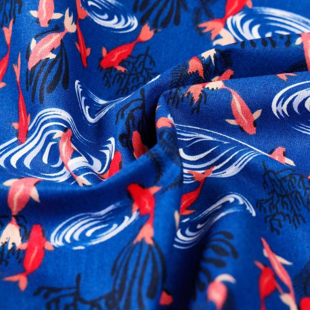 Tissu Coton imprimé petits poissons rouges sur fond Bleu roi
