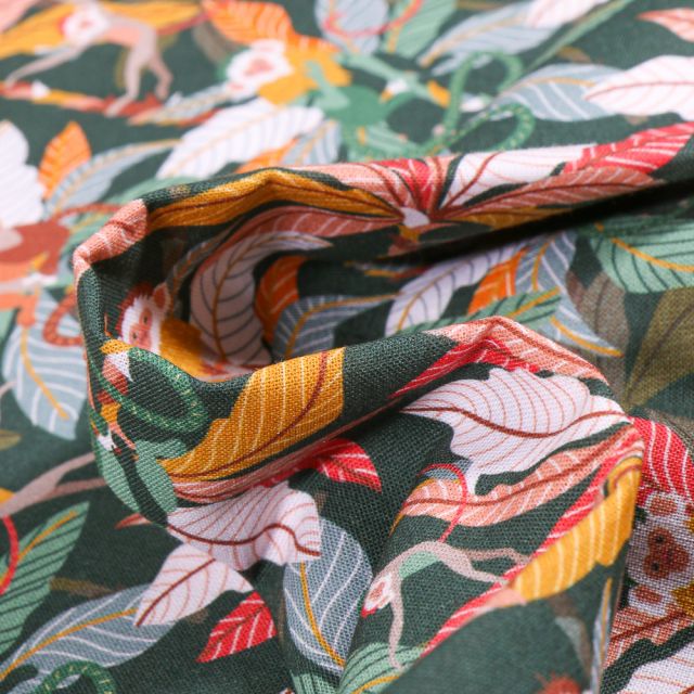Tissu Coton MC Fabrics Feuilles multicolores sur fond Vert foncé