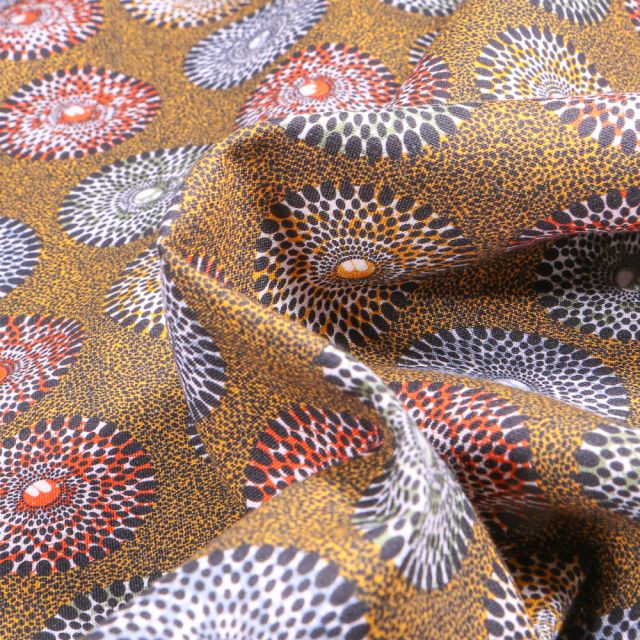 Tissu Coton imprimé Inaya sur fond Bronze