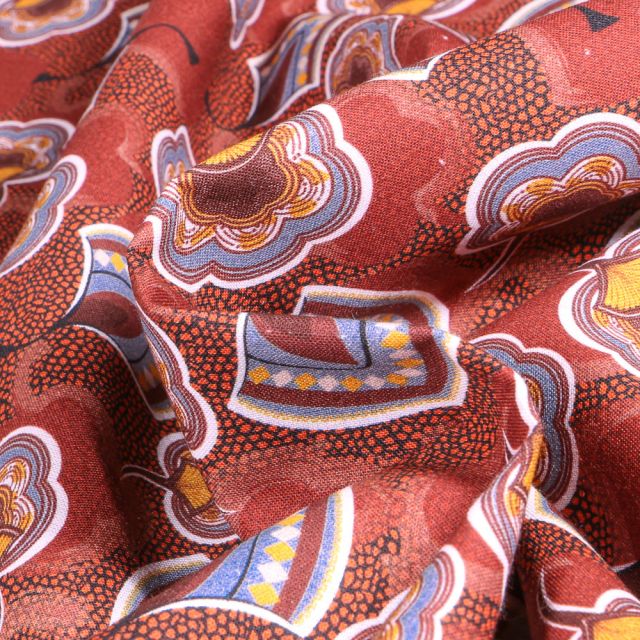 Tissu Coton imprimé Aminata sur fond Terre de Sienne