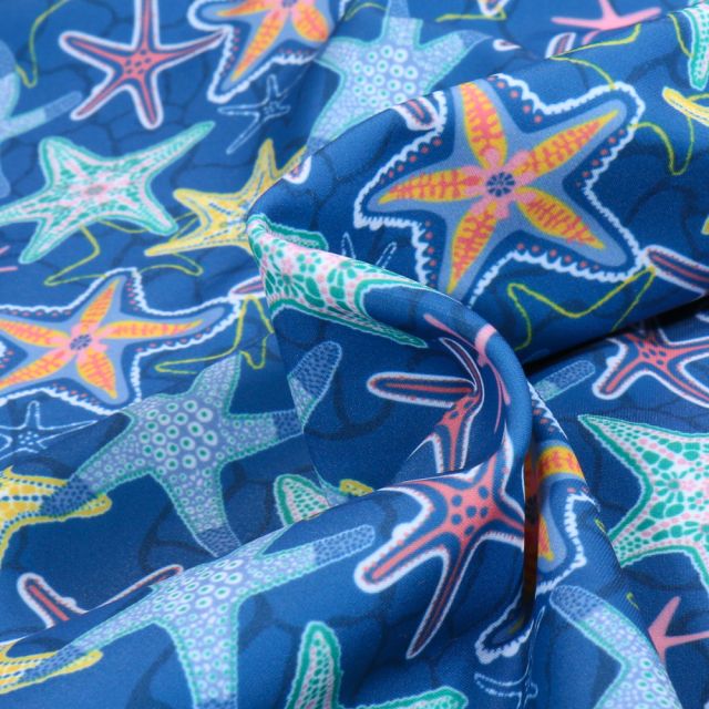 Tissu Lycra maillot de bain Etoiles des mers sur fond Bleu