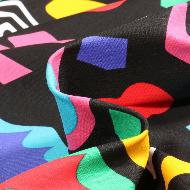 Tissu Jersey Coton Formes abstraites colorées sur fond Noir