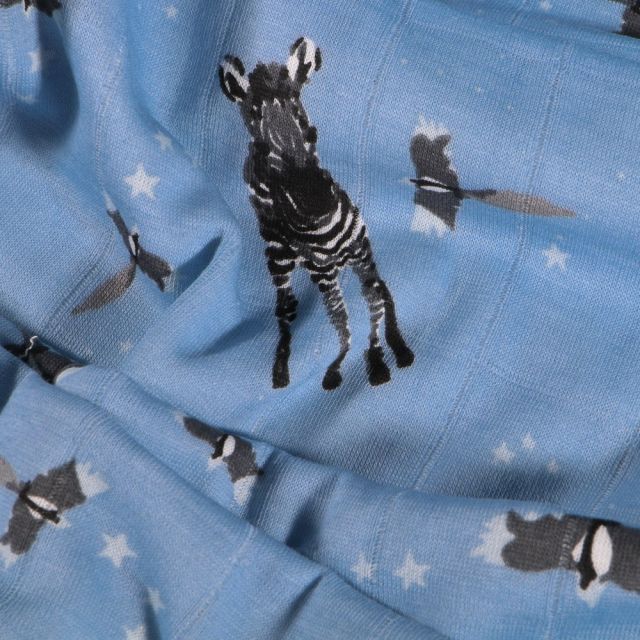 Tissu Jersey Coton hydrophile Zèbres et oiseaux sur fond Bleu - Par 10 cm