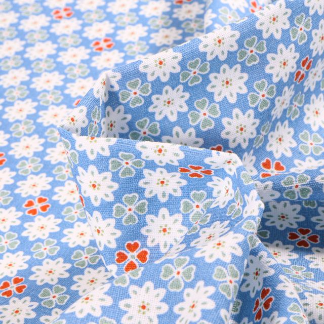Tissu Coton imprimé Chally Trèfles et fleurs sur fond Bleu ciel