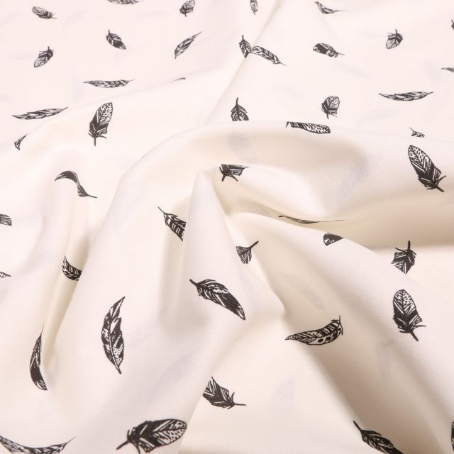 Tissu Coton imprimé Petites plumes sur fond Ecru - Par 10 cm
