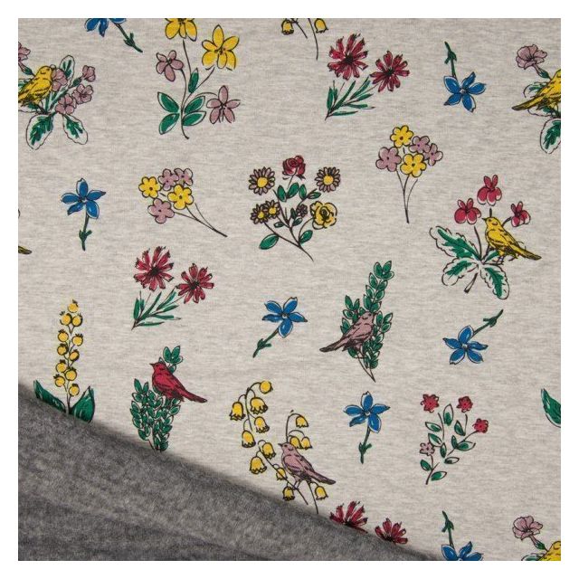 Tissu Sweat  envers minky Bouquets de fleurs et oiseaux sur fond Gris chiné - Par 10 cm