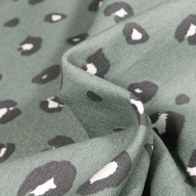 Tissu Jersey Coton Bio Tâche léopard sur fond Vert clair