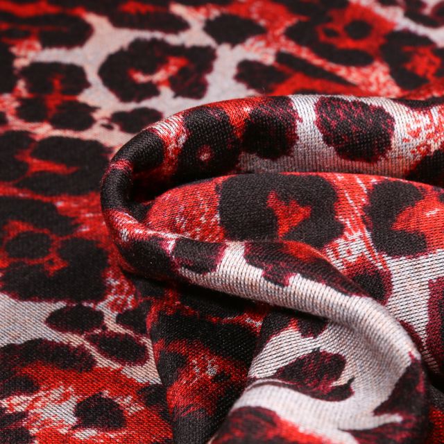Tissu Jersey Milano Tâches léopard sur fond Rouge