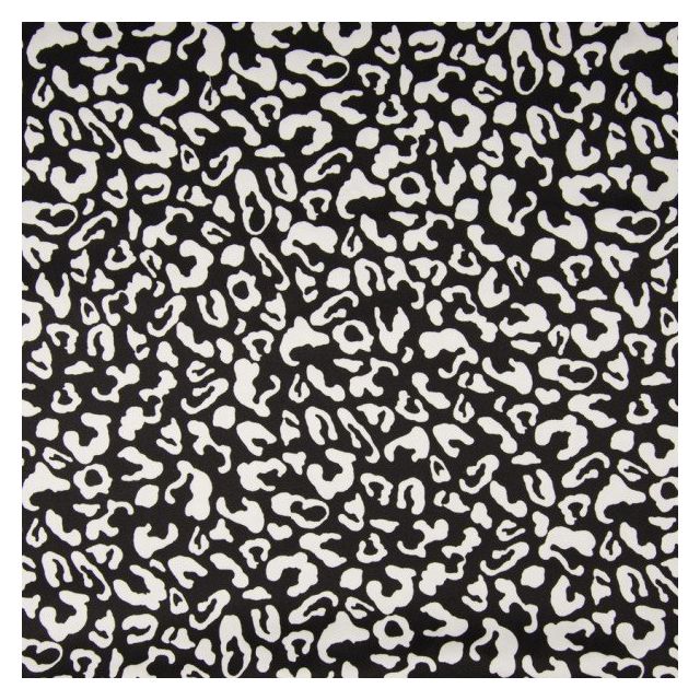 Tissu Coton satiné extensible Tâches léopard blanches sur fond Noir - Par 10 cm