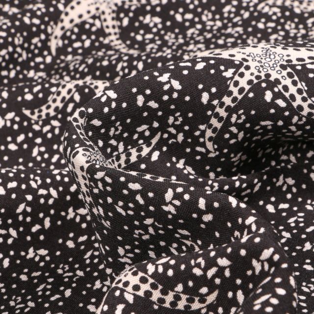 Tissu Viscose légère Etoile de mer Beige sur fond Noir